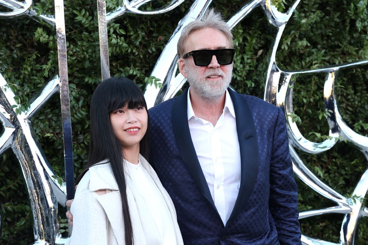 LOS ANGELES, CALIFORNIA - SEPTEMBER 19: (L-R) Riko Shibata and Nicolas Cage attend the Lucas Museum of Narrative Art Opening Night at Lucas Museum of Narrative Art on September 19, 2026 in Los Angeles, California. Monica Schipper/Getty Images for Lucas Museum of Narrative Art/AFP (Photo by Monica Schipper / GETTY IMAGES NORTH AMERICA / Getty Images via AFP)
