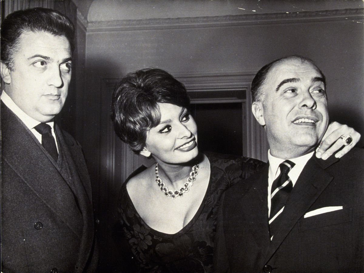 Jun 01, 1958; Hollywood, California, USA; 1958, Pictured: FEDERICO FELLINI, SOPHIA LOREN, CARLO PONTI. Mandatory Credit: Photo by SNAP/ZUMA Press. (©) Copyright 1958 by Movie Studio