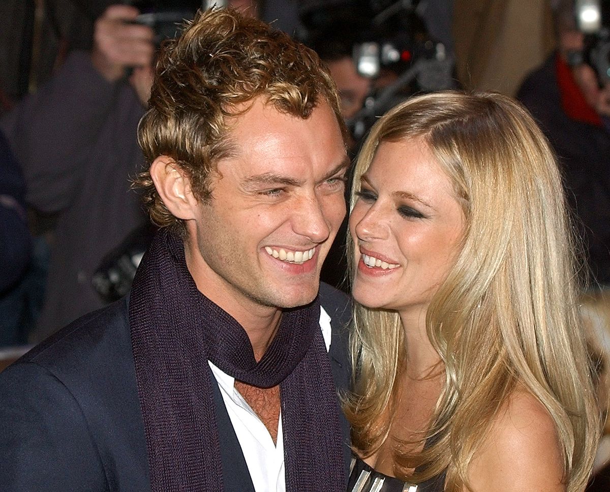 Actor Jude Law and his co-star Sienna Miller as they arrive for the World Premiere of their latest film Alfie, in London's Leicester Square, Thursday October 14, 2004. Photo by John Morn/ABACA