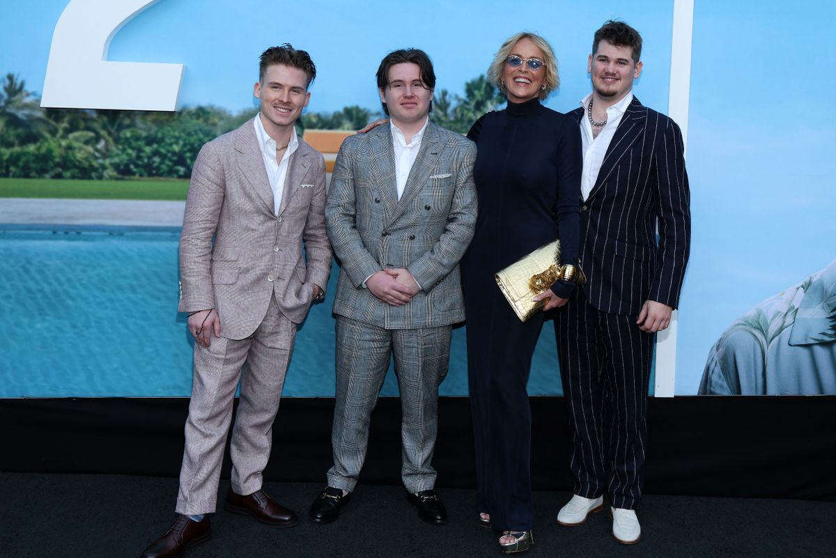 US actress Sharon Stone and her sons (L-R) Roan Stone, Quinn Stone and Laird Stone attend the premiere of Universal's "Nobody 2" at the TCL Chinese Theatre in Hollywood, California, on August 11, 2025. (Photo by VALERIE MACON / AFP)