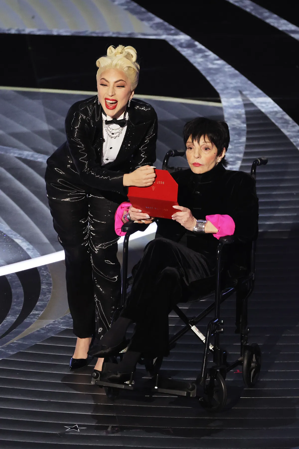 HOLLYWOOD, CALIFORNIA - MARCH 27: (L-R) Lady Gaga and Liza Minnelli speak onstage during the 94th Annual Academy Awards at Dolby Theatre on March 27, 2022 in Hollywood, California. (Photo by Neilson Barnard/Getty Images)