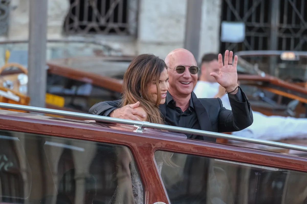 VENICE, ITALY - JUNE 28: Jeff Bezos and Lauren Sanchez are seen leaving the Aman Hotel for a party at the Arsenale on June 28, 2025 in Venice, Italy. (Photo by Stefano Mazzola/GC Images)
