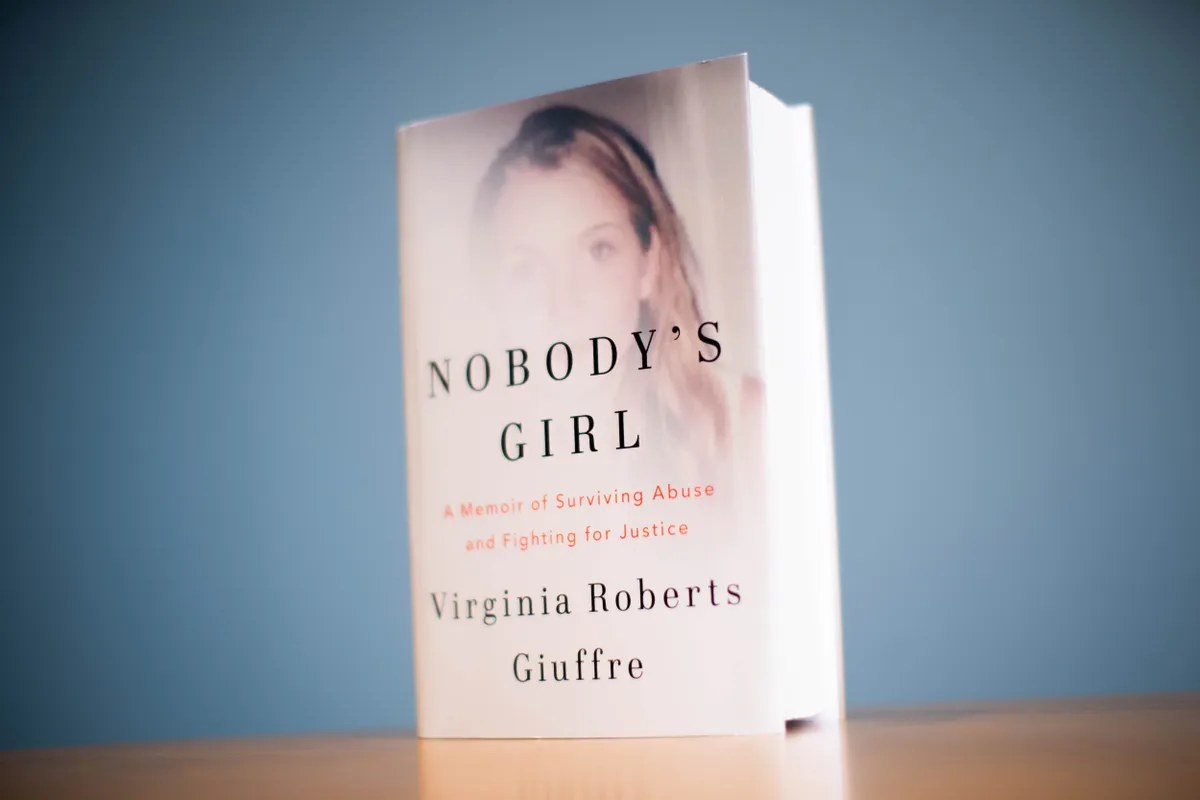 A copy of Nobody's Girl by Virginia Roberts Giuffre, which will be published on Tuesday. Prince Andrew relinquished his dukedom and other honours on Friday, after excerpts from the posthumous autobiography of Ms Giuffre were released. Picture date: Monday October 20, 2025.