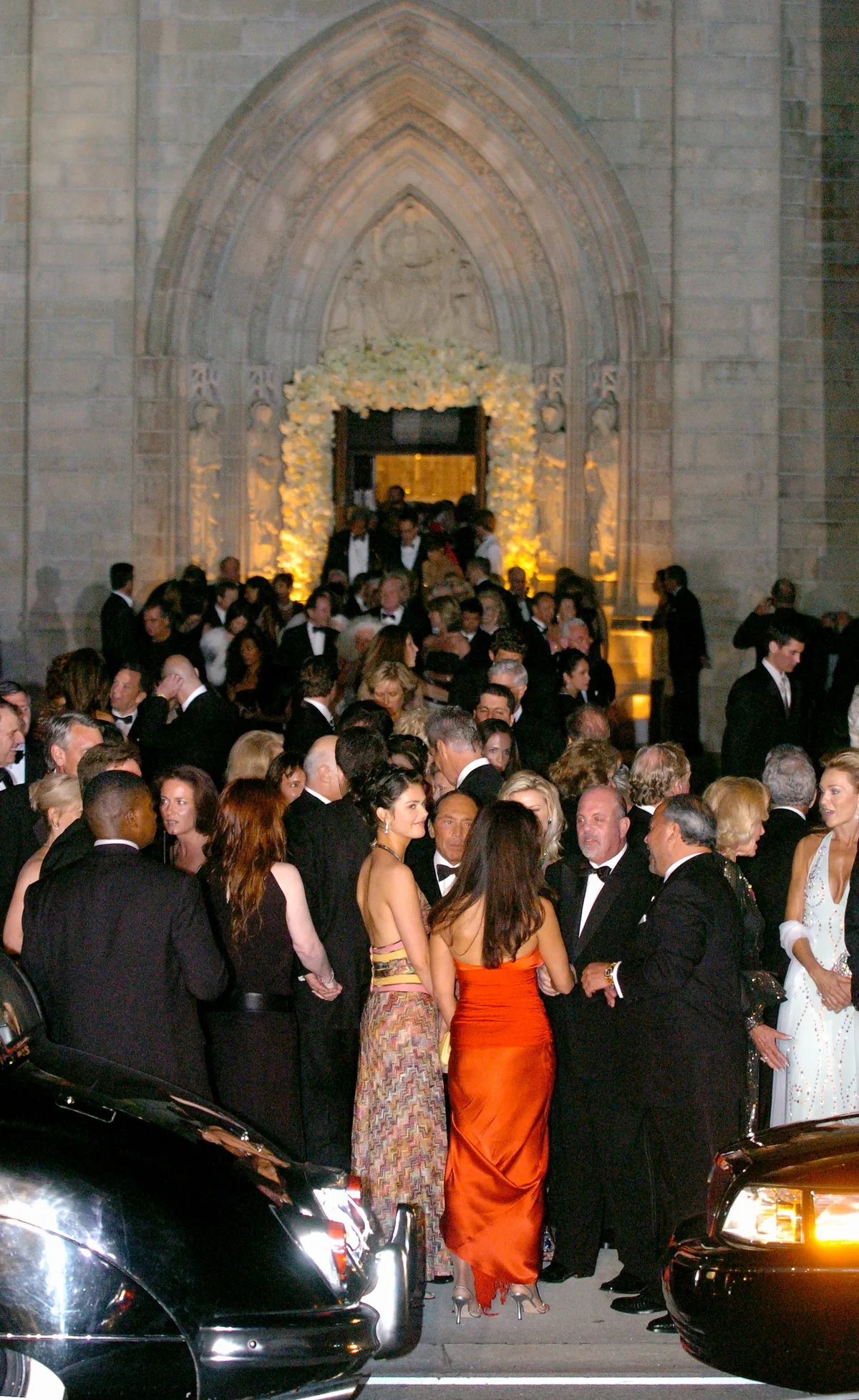 Wedding guests, including Billy Joel (lower right) and wife