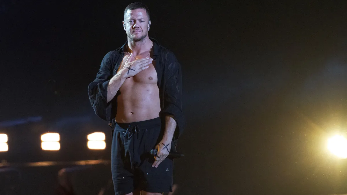 US rock band Imagine Dragons' lead singer Dan Reynolds performs on stage in front of the Chateau de Chambord castle on September 8, 2023 in Chambord, central France. (Photo by GUILLAUME SOUVANT / AFP)