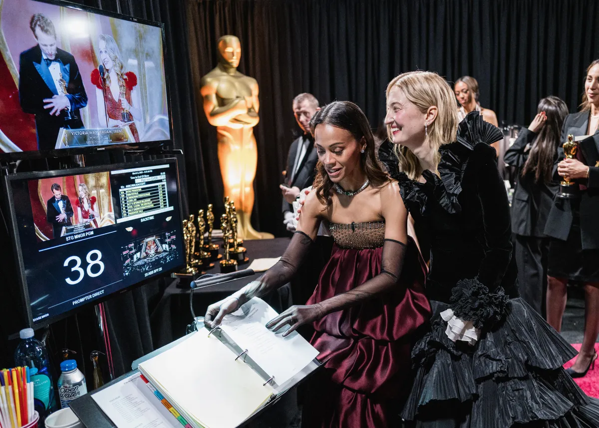 HOLLYWOOD, CALIFORNIA - MARCH 02: (EDITORIAL ONLY, NO BOOK COVERS) (L-R) Zoe Saldana and Alba Rohrwacher are seen backstage during the 97th Annual Oscars at Dolby Theatre on March 02, 2025 in Hollywood, California. (Photo by John Shearer/97th Oscars/The Academy via Getty Images)