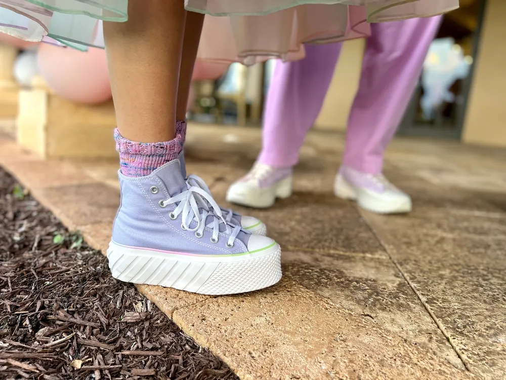 Purple platform shoes coupled with matching shoes
