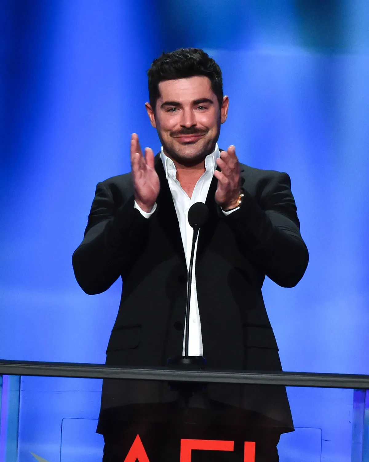 HOLLYWOOD, CALIFORNIA - APRIL 27: Zac Efron speaks onstage during the 49th AFI Life Achievement Award Gala Tribute celebrating Nicole Kidman at Dolby Theatre on April 27, 2024 in Hollywood, California. (Photo by Alberto E. Rodriguez/Getty Images)