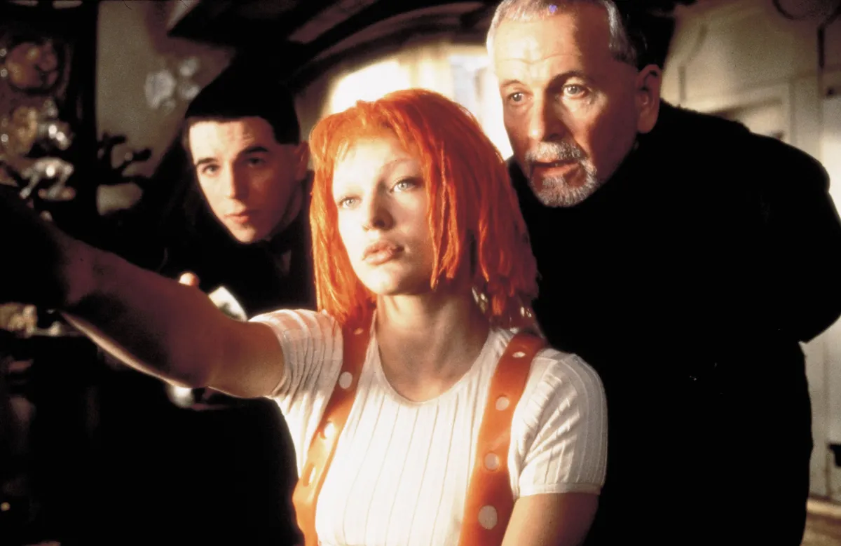 1997; The Fifth Element. Original Film Title: The Fifth Element, PICTURED: CHARLIE CREED MILES, IAN HOLM, MILLA JOVOVICH, Composer: Eric Serra, Director: Luc Besson, IN CAST: Bruce Willis, Gary Oldman, Milla Jovovich, Ian Holm, Charlie Creed Miles, Chris Tucker, MaÏwenn Le Besco 
