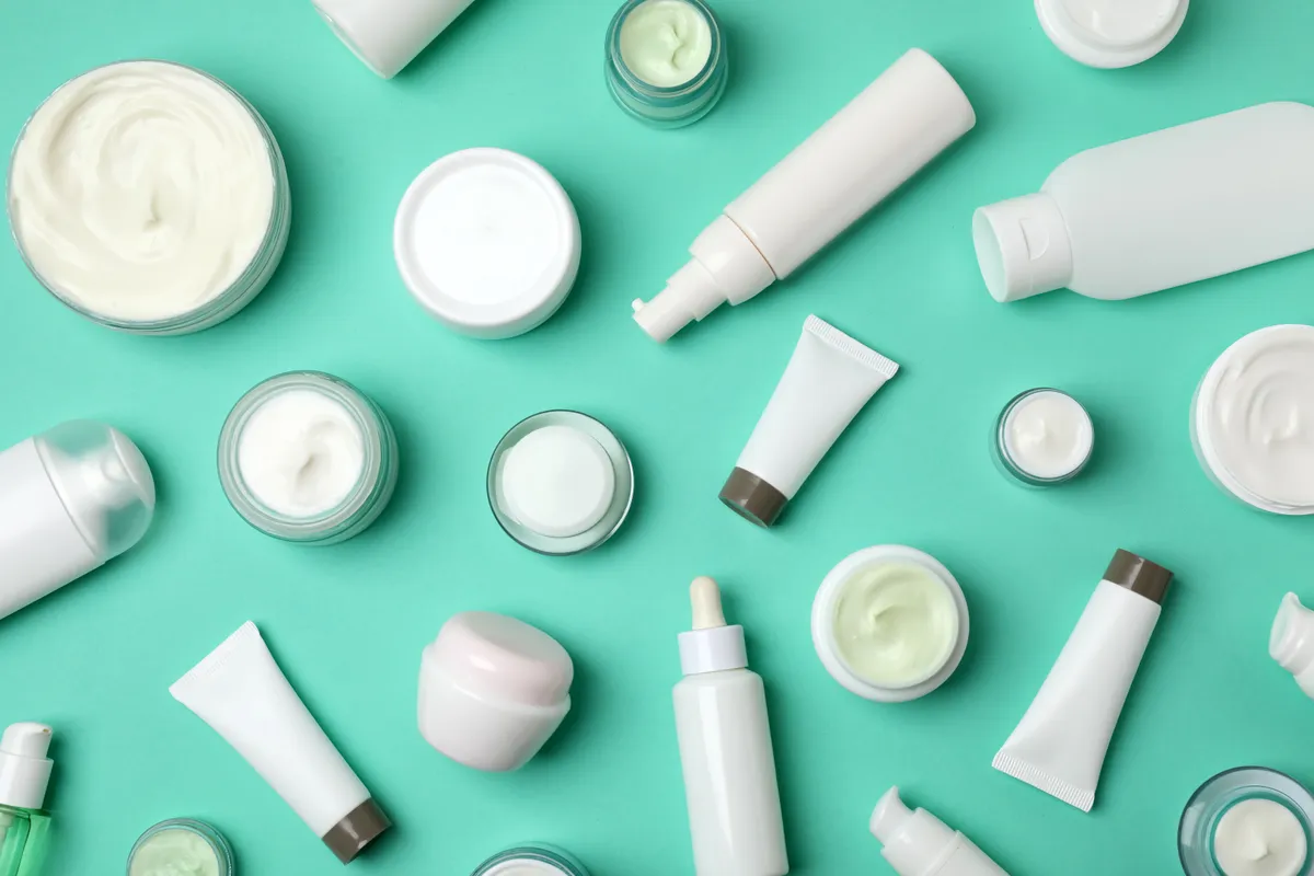 Flat,Lay,Composition,With,Cosmetic,Products,On,Color,Background