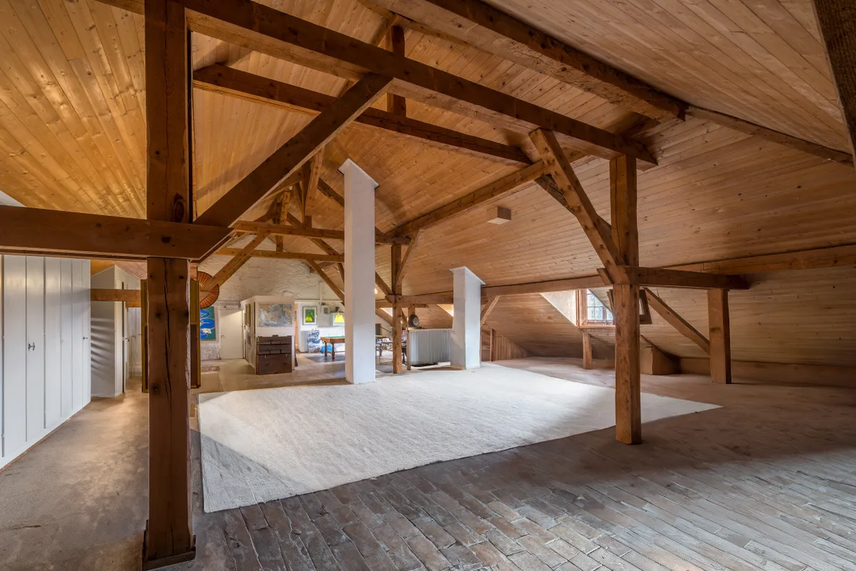 Beautiful exposed beams inside, VAUD, SWITZERLAND, A STUNNING 18th CENTURY VILLA owned by Audrey Hepburn could be yours as it hits the market.
The 12-bedroom home with a Grade 2 architectural classification, owned by the Hollywood icon for three-decades is located in the picturesque village of Tolochenaz, Lausanne, Vaud Switzerland and has been put up for sale for an undisclosed price.
Images show the exquisite Swiss villa on this ultra-rare estate known as La Paisible meaning, the peaceful place. The main residence spans approximately 1,000 sq m across three levels and is served by two staircases and a lift. It was fully renovated in 2001.
There are terracotta floors, oak parquet, and five exquisite fireplaces. The expansive home boasts 21 rooms, including 12 generously proportioned bedrooms, a sumptuous principal suite, and eight bathrooms.
The property has five entrances, including one leading to a self-contained service apartment featuring two bedrooms and a fully equipped kitchen, seamlessly integrated into the main house.
The estate’s outdoor space includes the vast parkland, spanning over 16,000 sq m which is dotted with century-old trees, creating a tranquil retreat. There is also a heated swimming pool (15x5m) discreetly positioned away from the main house, offering ultimate privacy.
Two indoor garages and ample outdoor parking accommodate up to 15 vehicles.
The listing is held by Alex Koch de Gooreynd, Partner at Knight Frank.
"This outstanding residence is a rarity among exceptional properties," states the listing.
"This exceptional residence exudes a unique charm and is steeped in history.
“Switzerland remains a top choice for families mindful of taxation, with a steady flow of new enquiries exploring its diverse lifestyle offerings across the cantons.
“While not the most affordable tax jurisdiction, Switzerland stands out for its exceptional stability, personal safety, and world-class education. Cantons that best align with families’ previous lifestyles are benefiting the most—particularly the Lake Geneva region and year-round resort destinations like Verbier, Gstaad, and Crans Montana, where access to private schools and vibrant communities is a key draw.
“Le Paisible, nestled in the tranquil village of Tolochenaz, offers an ideal balance of privacy and accessibility. Just a short drive from Lausanne—a dynamic alternative to Geneva with excellent schools—this charming country home provides a vast flat plot, exceptional seclusion, and ample space for a large family.
“With property prices nearly 40% lower than Geneva and the airport just 35 minutes away, Lausanne is an increasingly attractive option for international buyers.
“The home’s timeless architecture, a sought-after feature among Ultra-High-Net-Worth families, only adds to its appeal. It’s easy to see why Audrey Hepburn adored the environment, where she enjoyed both complete privacy and breathtaking surroundings.”
ENDS