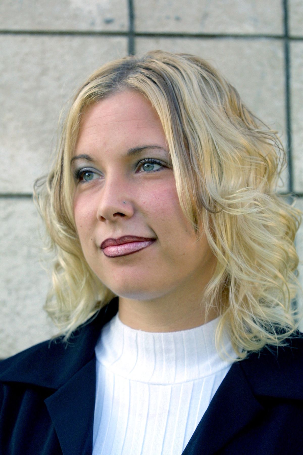 WARREN, MI - OCTOBER 2: (FILE PHOTO) Kimberly Anne Mathers stands outside of court after attending a hearing on charges of disturbing the peace at the 37th District Court October 2, 2001 in Warren, Michigan. According to reports January 14, 2006, Mathers and ex-husband, rapper Eminem, have remarried. (Photo by Bill Pugliano/Getty Images) *** Local Caption *** Kimberly Anne Mathers (Photo by Bill Pugliano / Getty Images North America / Getty Images via AFP)