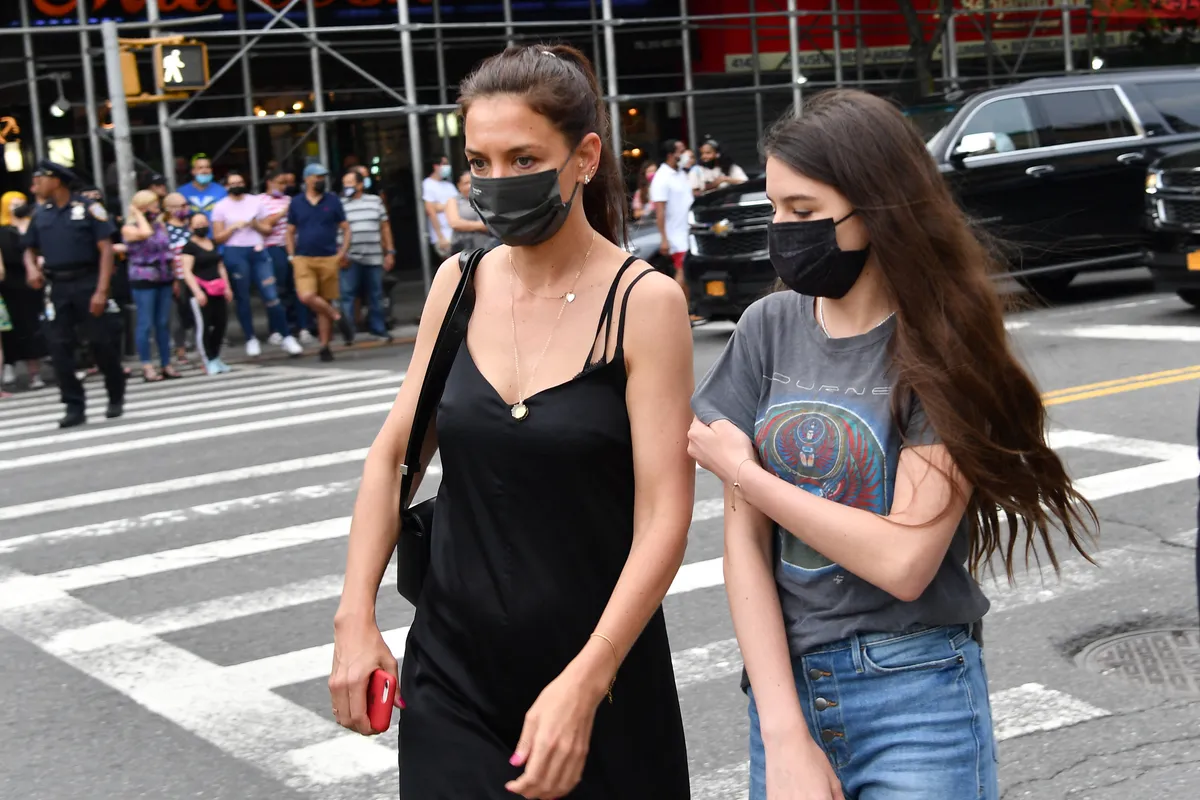 US actress Katie Holmes and daughter Suri Cruise arrive the opening night premiere of "In The Heights" during the Tribeca Festival at the United Palace Theatre on June 9, 2021 in New York City. (Photo by Angela Weiss / AFP)
