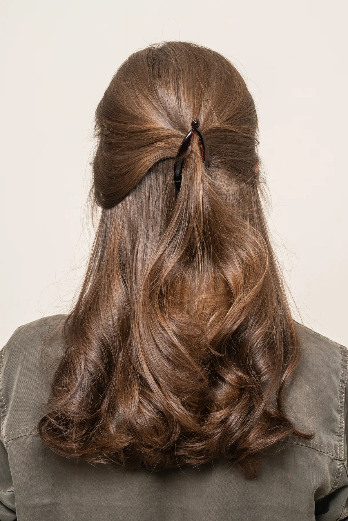 Beautiful girl with makeup and long hair With Hair Clips