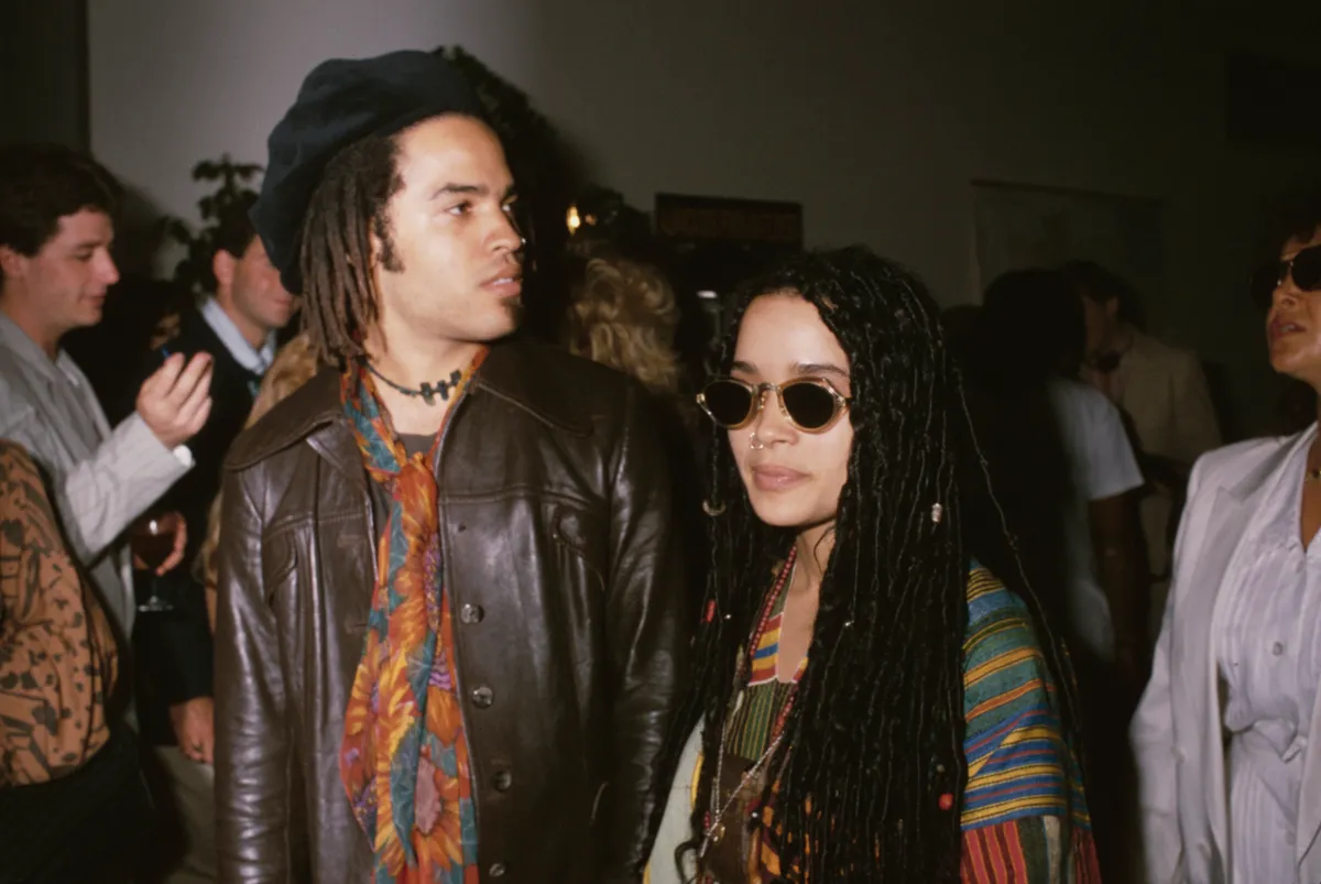 American singer-songwriter and musician Lenny Kravitz, wearing a brown leather jacket and a scarf, and American actress Lisa Bonet (Lilakoi Moon), wearing sunglasses, attend an event in New York City, New York, 17th August 1987. (Photo by Vinnie Zuffante/Getty Images)
