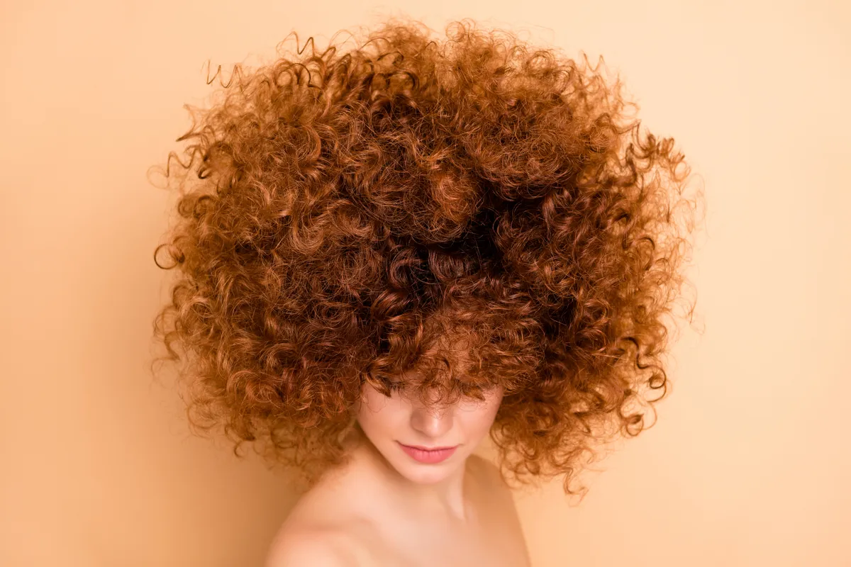 Close up side profile photo beautiful she her wear no clothes nude look down lady dreamer ideal skin condition salon stylist curls perms roller curlers tint wellness isolated beige pastel background