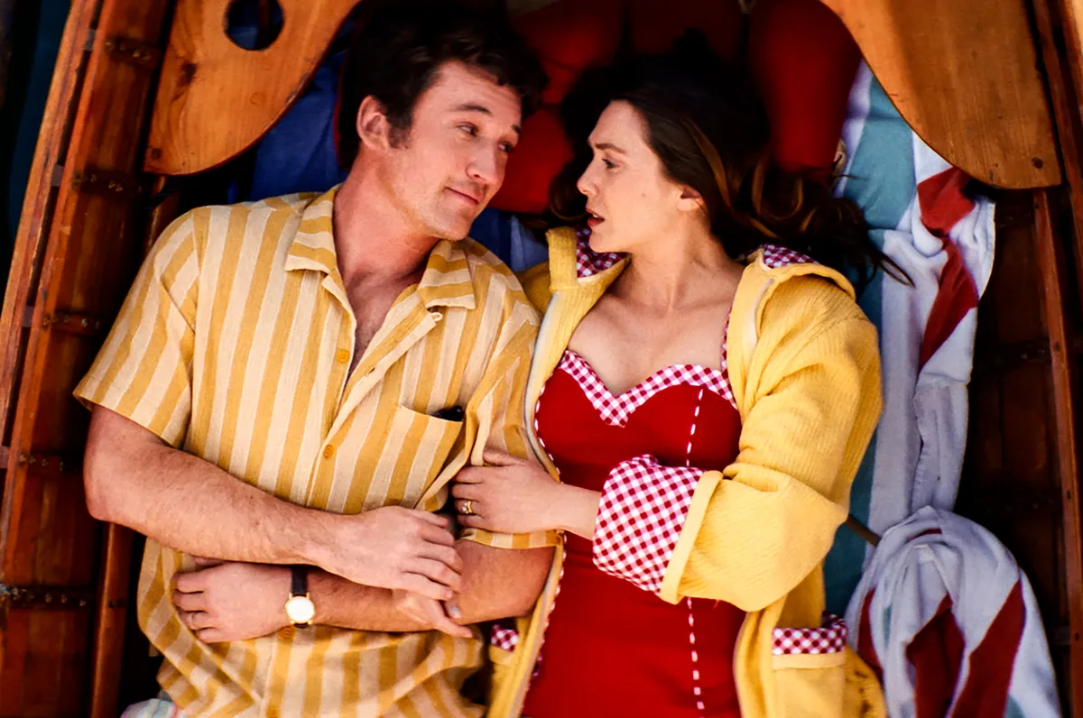USA. Elizabeth Olsen and Miles Teller in  (C)A24 new movie: Eternity (2025). 
Plot: In an afterlife where souls have one week to decide where to spend eternity, Joan is faced with the impossible choice between the man she spent her life with and her first love, who died young and has waited decades for her to arrive.,Image: 1053623431, License: Rights-managed, Restrictions: Supplied by Landmark Media. Editorial Only. Landmark Media is not the copyright owner of these Film or TV stills but provides a service only for recognised Media outlets., ***
HANDOUT image or SOCIAL MEDIA IMAGE or FILMSTILL for EDITORIAL USE ONLY! * Please note: Fees charged by Profimedia are for the Profimedia's services only, and do not, nor are they intended to, convey to the user any ownership of Copyright or License in the material. Profimedia does not claim any ownership including but not limited to Copyright or License in the attached material. By publishing this material you (the user) expressly agree to indemnify and to hold Profimedia and its directors, shareholders and employees harmless from any loss, claims, damages, demands, expenses (including legal fees), or any causes of action or allegation against Profimedia arising out of or connected in any way with publication of the material. Profimedia does not claim any copyright or license in the attached materials. Any downloading fees charged by Profimedia are for Profimedia's services only. * Handling Fee Only 
***, Model Release: no