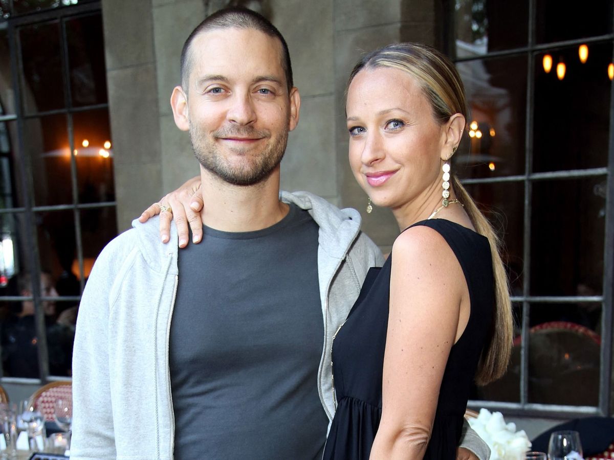 LOS ANGELES, CA - JUNE 18: Actor Tobey Maguire (L) and Jewerly designer Jennifer Meyer attend Jennifer Meyer for the Zoe Report Dinner at Chateau Marmont on June 18, 2014 in Los Angeles, California. Rachel Murray/Getty Images for Rachel Zoe Inc./AFP (Photo by Rachel Murray / GETTY IMAGES NORTH AMERICA / Getty Images via AFP)