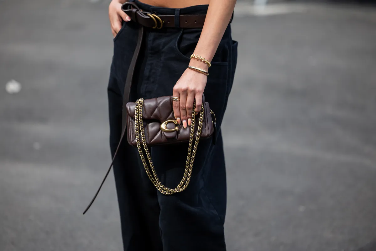 NEW YORK, NEW YORK - SEPTEMBER 15: Toni Breidinger wears pants, brown bag outside Coach during New York Fashion Week on September 15, 2025 in New York City. (Photo by Christian Vierig/Getty Images)