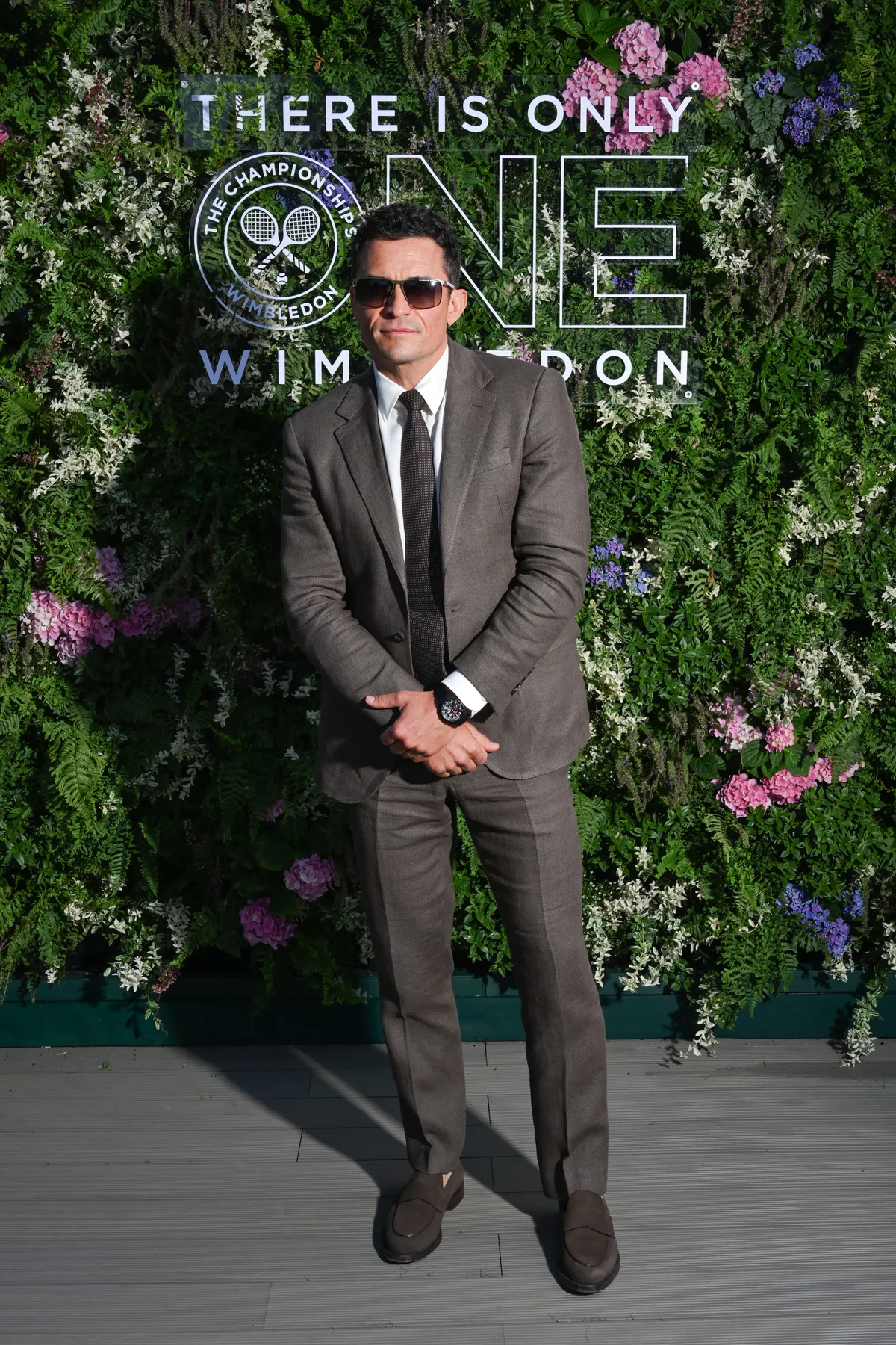 LONDON, ENGLAND - JULY 13: Orlando Bloom in the AELTC's Parkside Suite in No.1 Court at The Championships 2025. Held at the All England Lawn Tennis and Croquet Club, Wimbledon. Day 14, on July 13, 2025 in London, England. (Photo by Stuart C. Wilson/Getty Images for AELTC)