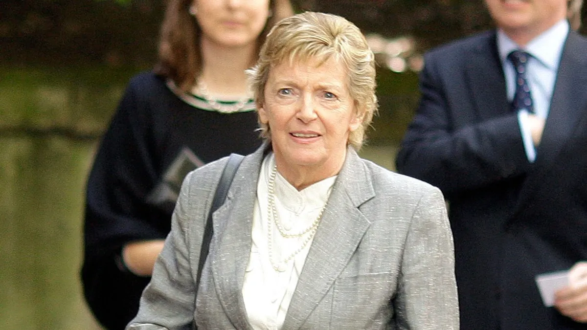Jill Freud, wife of late British writer and broadcaster Clement Freud, is pictured outside Saint Bride's Church before his funeral in central London, on April 24, 2009. British writer and broadcaster Clement Freud, a grandson of psychoanalysis pioneer Sigmund Freud, died on April 15, 2009 at the age of 84.  The bearded former Liberal lawmaker, a brother of the painter Lucian Freud, was known for his wit and was still a regular contributor on the BBC radio panel programme "Just a Minute", broadcast on BBC World Service radio. AFP PHOTO/Shaun Curry (Photo by SHAUN CURRY / AFP)