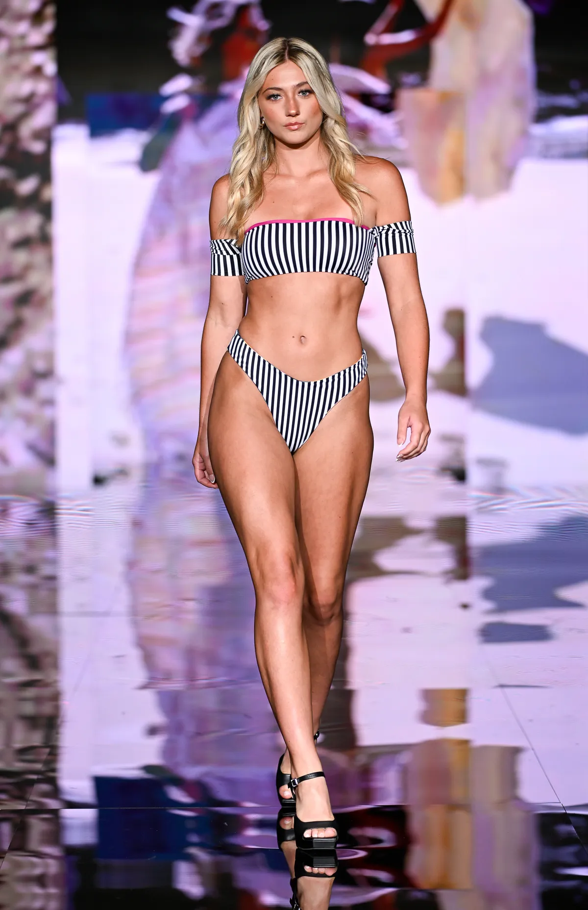 MIAMI BEACH, FLORIDA - MAY 29: A model walks the runway at the Strange Bikinis show during Miami Swim Week Powered By Art Hearts Fashion at Eden Roc Hotel on May 29, 2025 in Miami Beach, Florida. (Photo by Arun Nevader/Getty Images for Art Hearts Fashion)