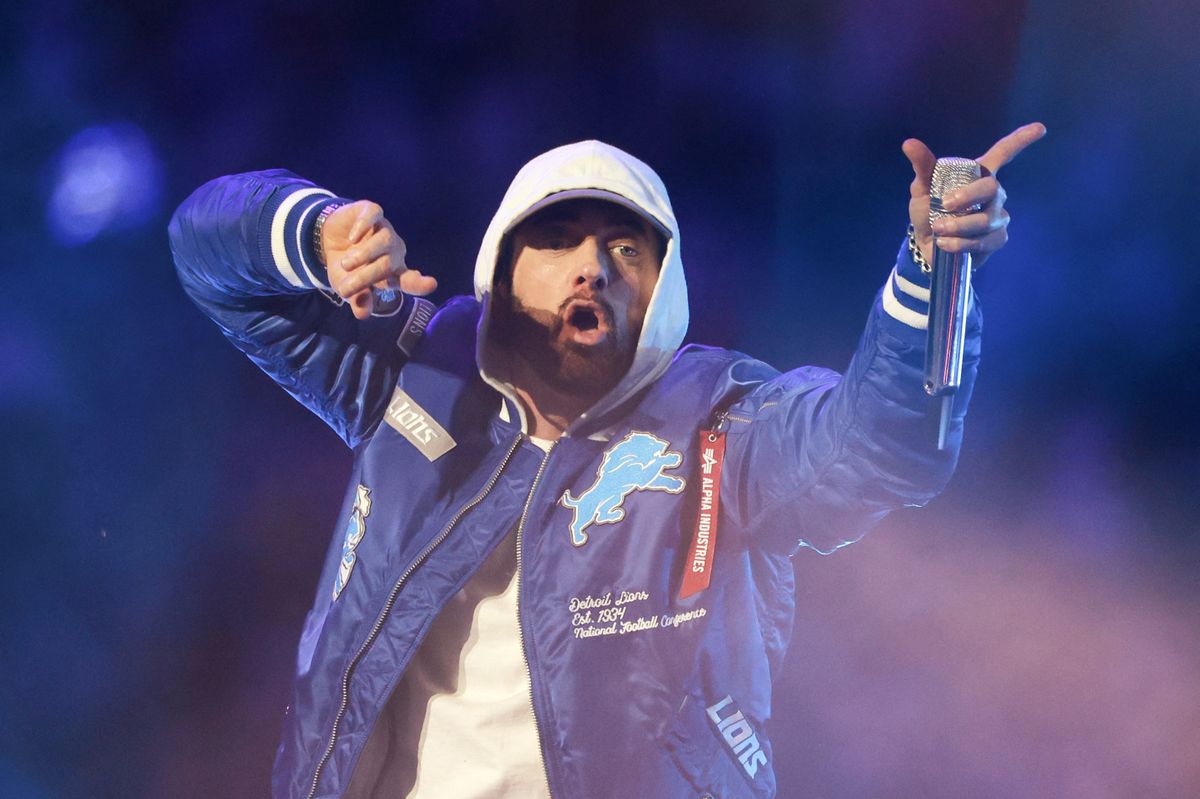 DETROIT,MICHIGAN-November27: American rapper, songwriter, and record producer Eminem performs with Jack White during an NFL football game between the Green Bay Packers and the Detroit Lions in Detroit, Michigan USA, on Sunday, November 23, 2025. (Photo by Amy Lemus/NurPhoto) (Photo by Amy Lemus / NurPhoto via AFP)